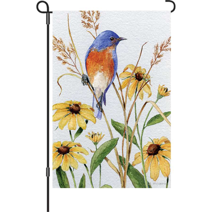 12 in. Bluebird and Susies illuminated garden flag featuring colorful bluebird designs displayed in a garden setting, enhancing outdoor aesthetics.