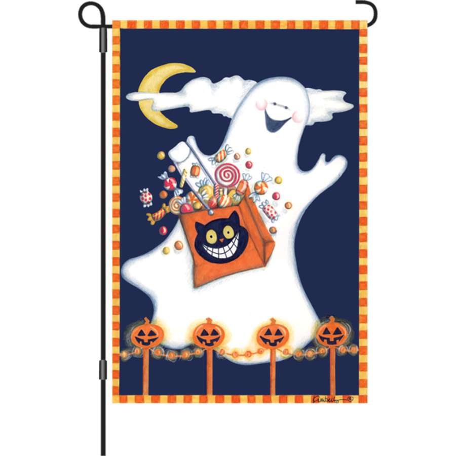 12 in. Candy Ghost illuminated garden flag featuring playful ghost designs on a colorful background, displayed outdoors in a garden setting.