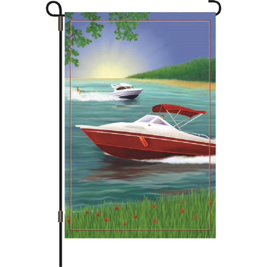 12 in. Changes in Latitude garden flag featuring vibrant tropical design displayed in an outdoor garden setting.