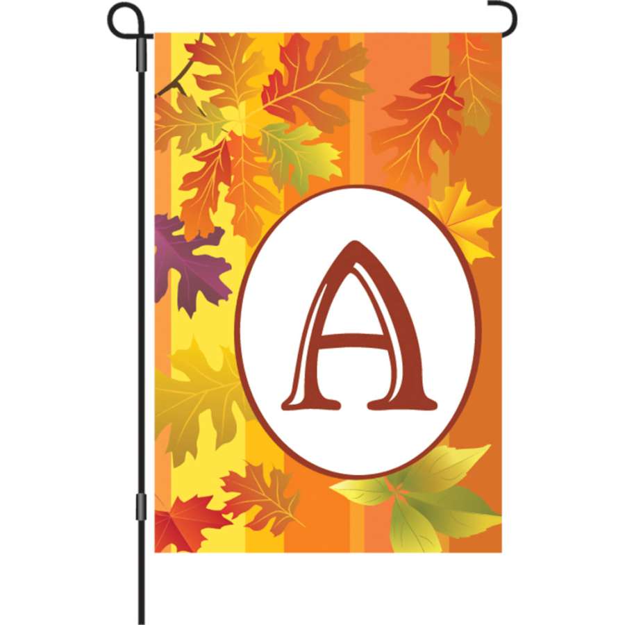 12 in. Fall Monogram Flag - A displayed outdoors, showcasing vibrant autumn colors and a personalized initial on a garden flag holder.