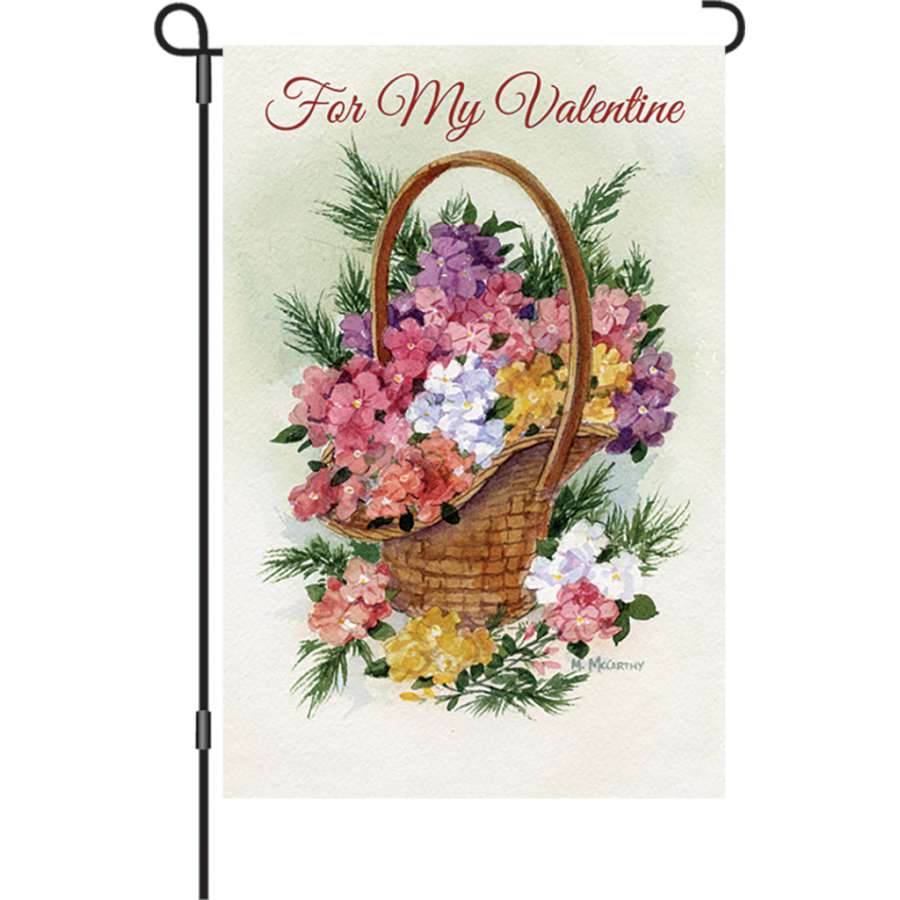 12 inch 'For My Valentine' garden flag made of soft fabric, displaying a vibrant romantic design, positioned in a delightful outdoor setting.