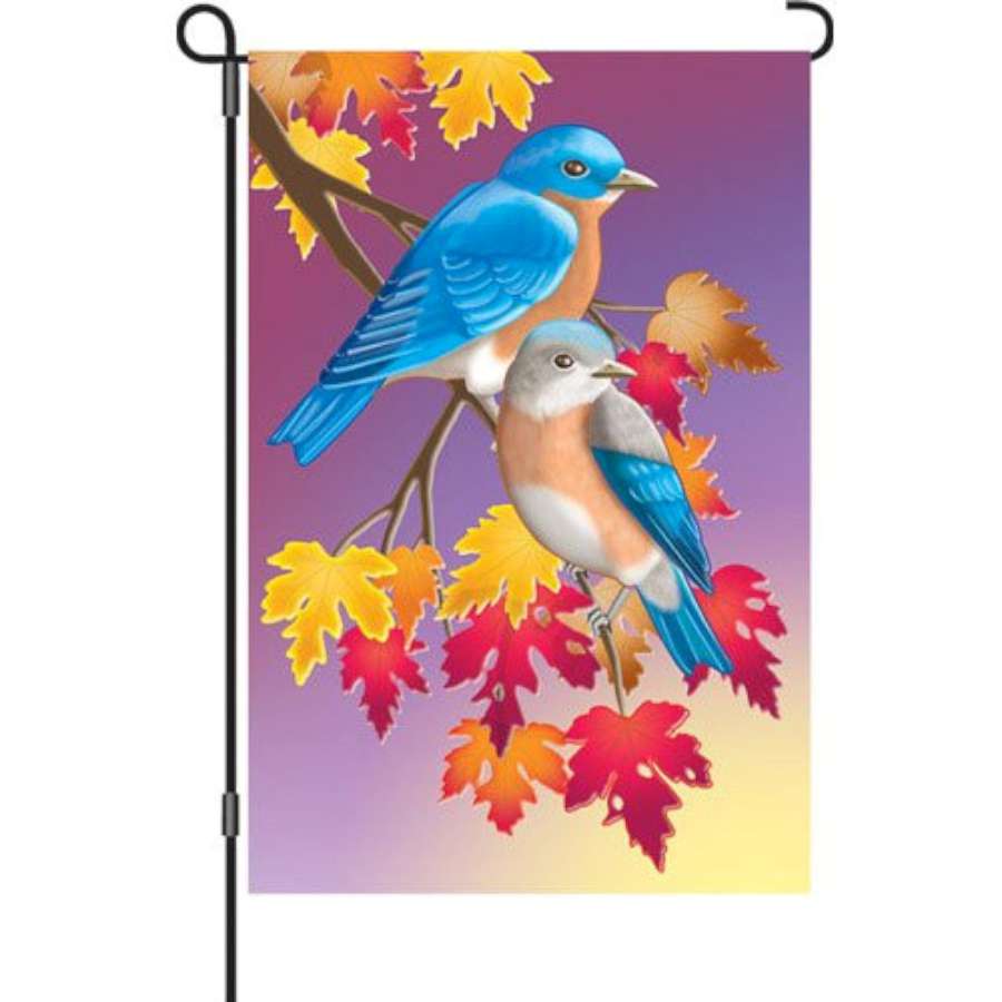 12 in. Flag - Prelude in Blue displaying an elegant autumn design in a garden setting, fluttering gently in the breeze.