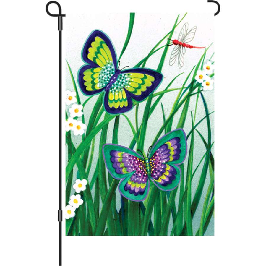 Illuminated 12 in. Flag - Sonata of Butterflies featuring vibrant butterflies displayed in a garden setting during daytime.