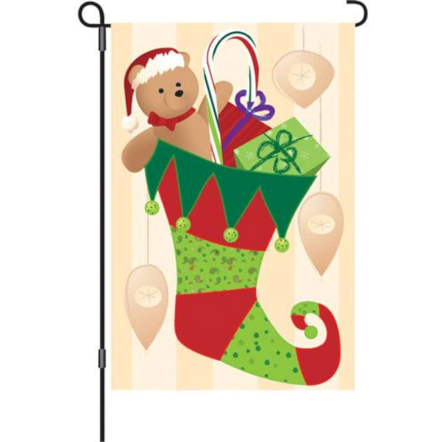 Vibrant 12 in. Flag - Stocking Stuffer displayed outdoors, showcasing festive winter holiday design perfect for seasonal decor.
