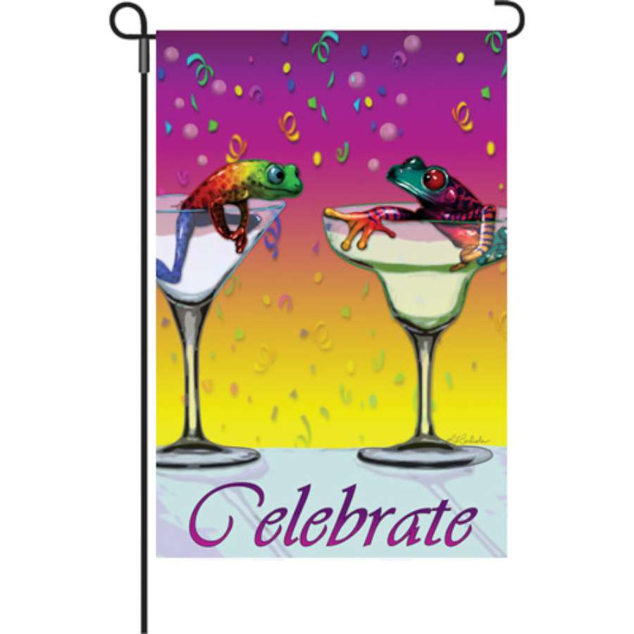 12 in. Joyful Moments garden flag with vibrant winter designs displayed elegantly in a garden setting.