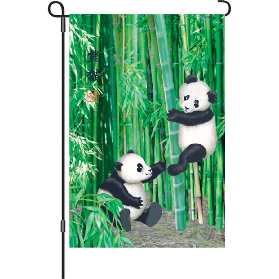 Illuminated 12 in. Playful Pandas Flag featuring bright panda graphics displayed on a decorative stand in a garden setting.