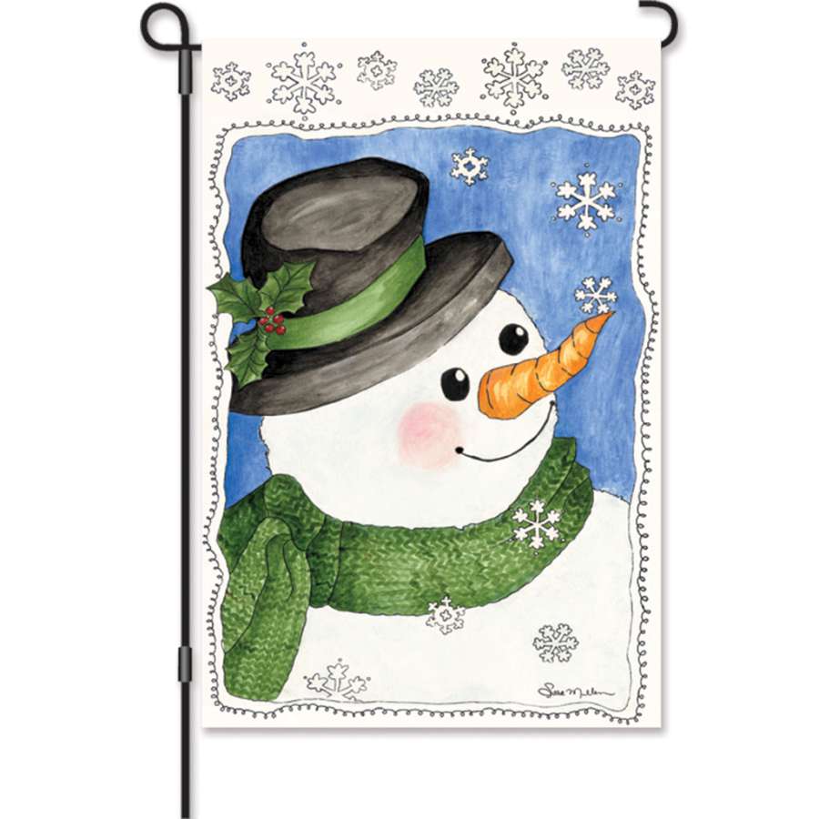 12 in. Sam Frost garden flag features festive illuminated winter design displayed on a standard flag holder in a colorful outdoor setting.