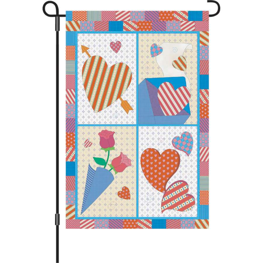 Colorful 12 in. Sweet Heart garden flag featuring hearts and flowers, displayed on a garden pole in a spring setting.