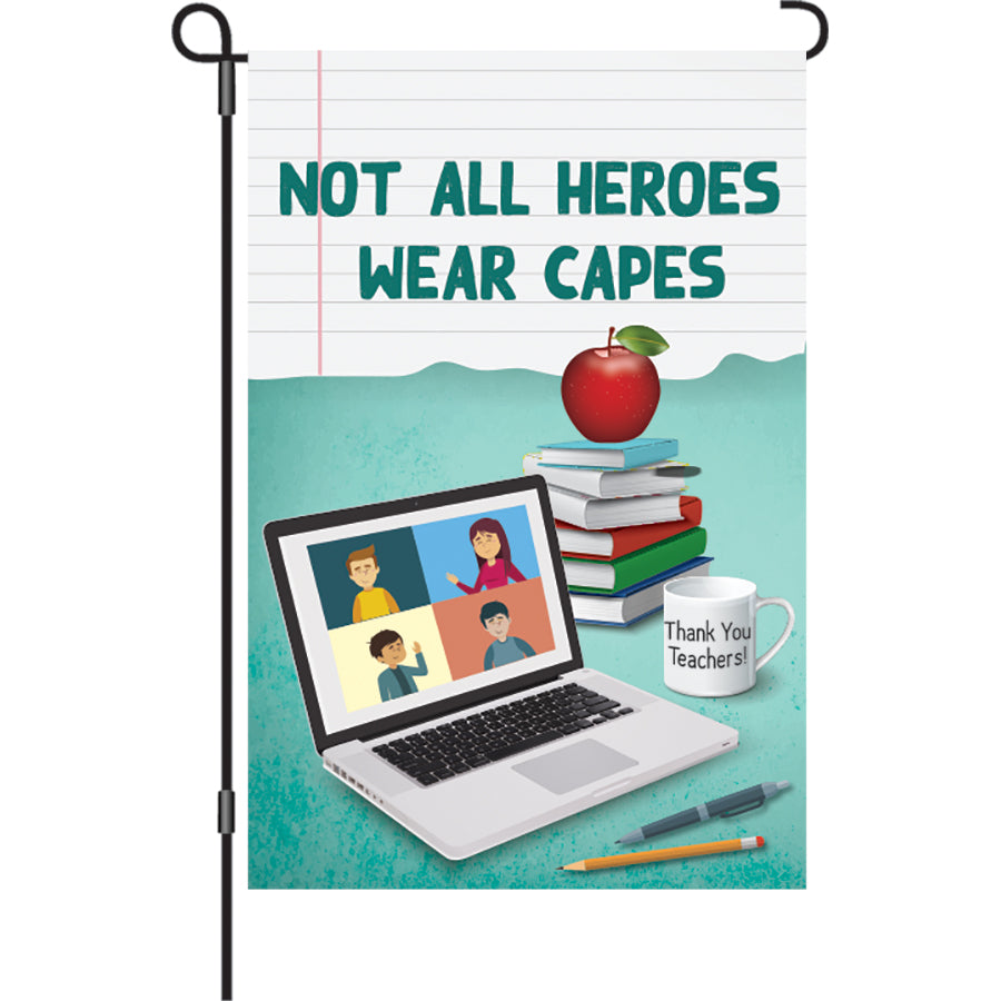 12 in. Teachers Flag showcasing the message 'NOT ALL HEROES WEAR CAPES' in vibrant colors, displayed in a garden setting.