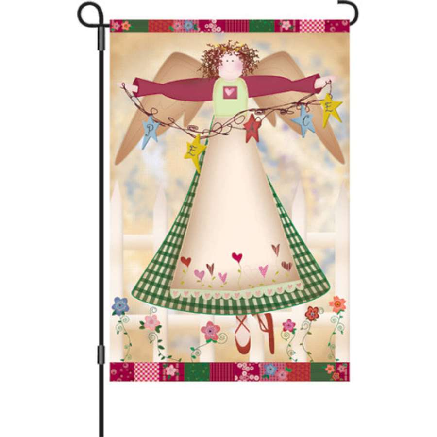 12-inch Angelic Grace garden flag showcasing an elegant angel design in winter colors, displayed outdoors in a garden setting.