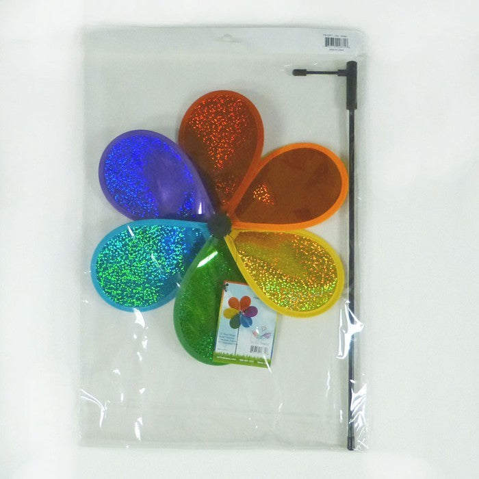 12-inch Rainbow Glitter Flower Spinner featuring colorful petals and a fiberglass pole, spinning effortlessly in a sunny garden setting.