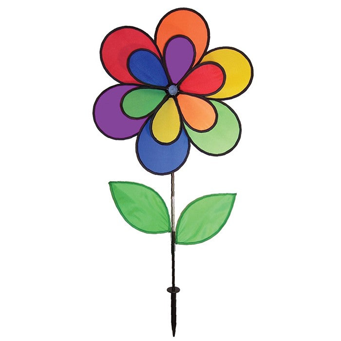 12-Petal Flower with Leaves Double Wheel Spinner featuring rainbow petals and leaves, displayed in a garden setting spinning gently in the breeze.