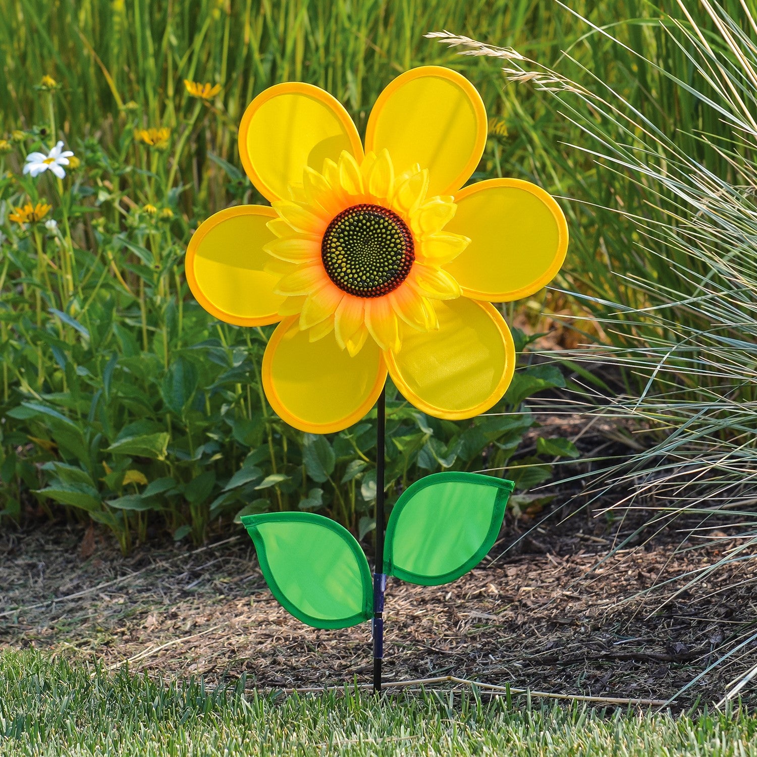 12" yellow sunflower spinner with bright petals and green leaves, designed to spin in the breeze for colorful outdoor decoration.