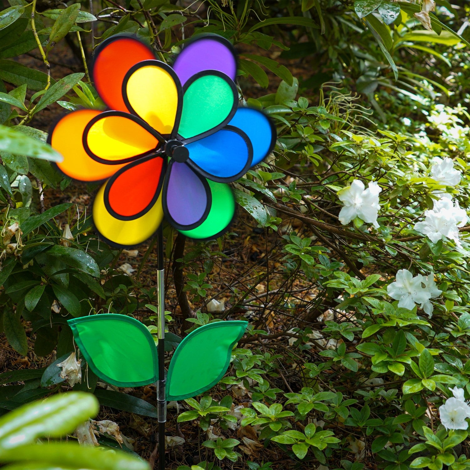 14-inch Rainbow Double Flower with Leaves garden spinner featuring colorful 12 petals and two green leaves, elegantly spinning in the breeze.