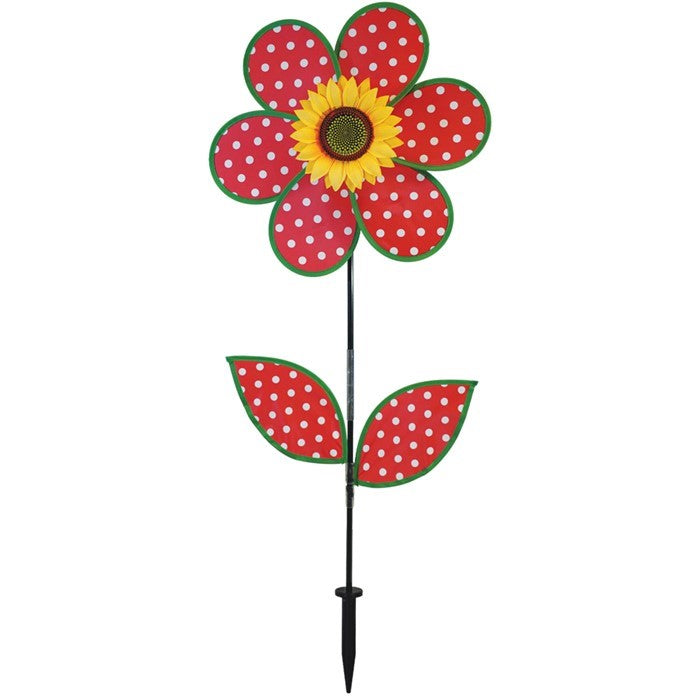 16" Polka Dot Flower with Leaves garden spinner featuring red and white polka dot petals and a sunflower center, displayed outdoors.