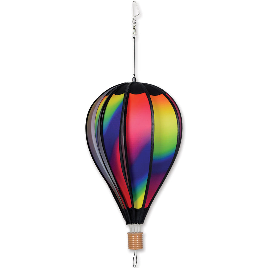 18 in. Hot Air Balloon - Wavy Gradient spinning outdoors, featuring a mix of vibrant colors in a whimsical design, perfect for decoration.