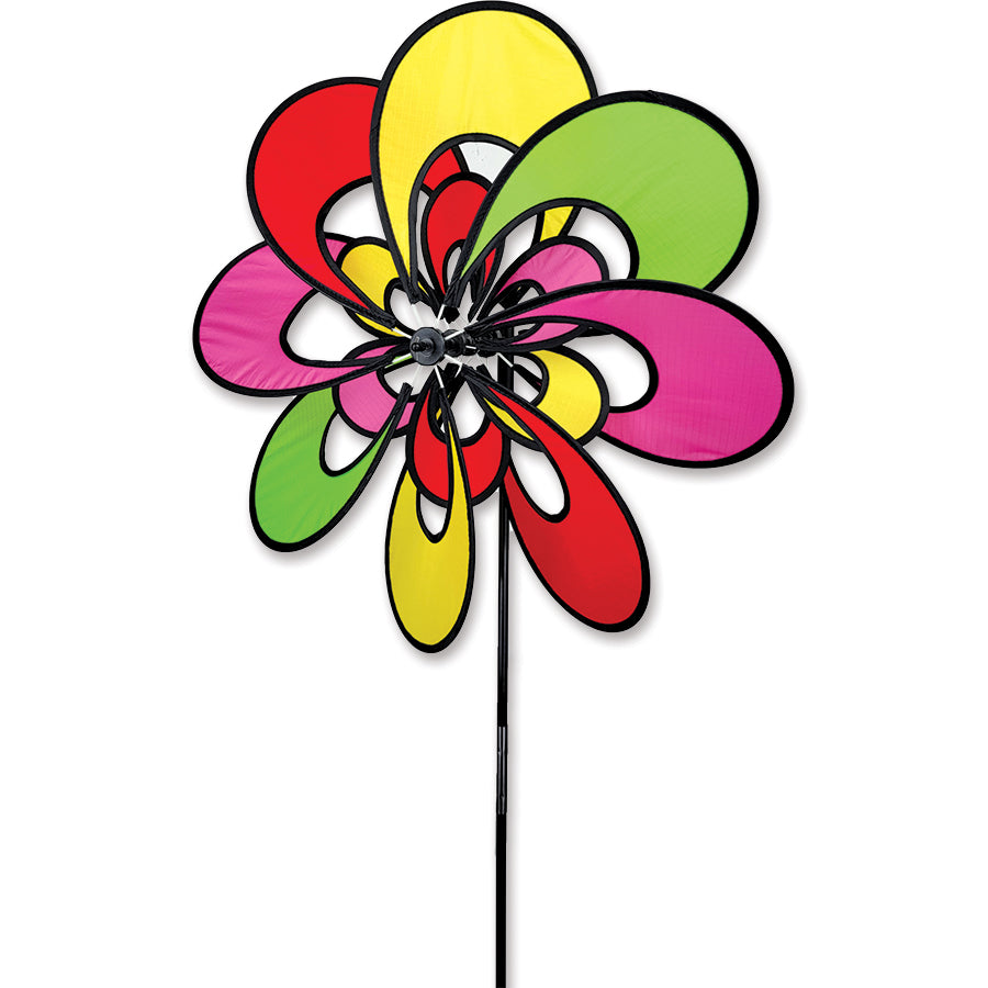19 in. Double Whirly Spinner with colorful rotating petals displayed in a garden setting, creating vibrant outdoor decor.