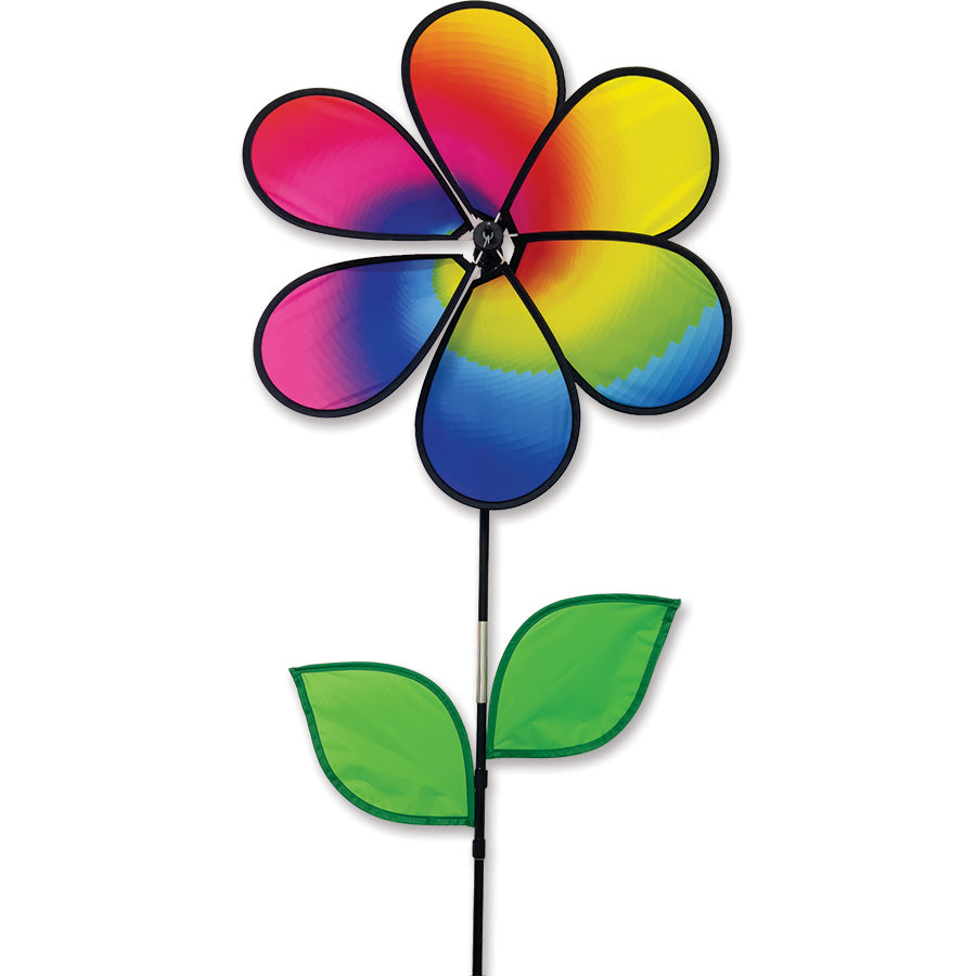 19 in. Flower Spinner - Rainbow Spiral featuring colorful spinning petals displayed in a lush garden setting, adding charm and motion to the landscape.