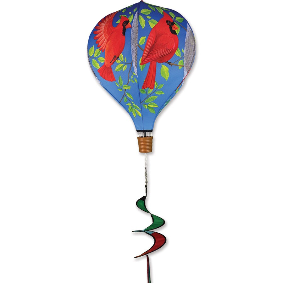 A vibrant 19 inch Pop-Open Hot Air Balloon wind spinner displayed outdoors, showcasing its colorful design and spinning action in the breeze.