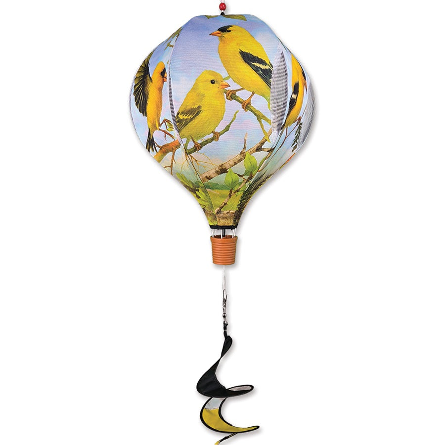 19 in. Pop-Open Hot Air Balloon featuring a goldfinch design spinning gracefully on a porch, showcasing vibrant colors against a clear sky.