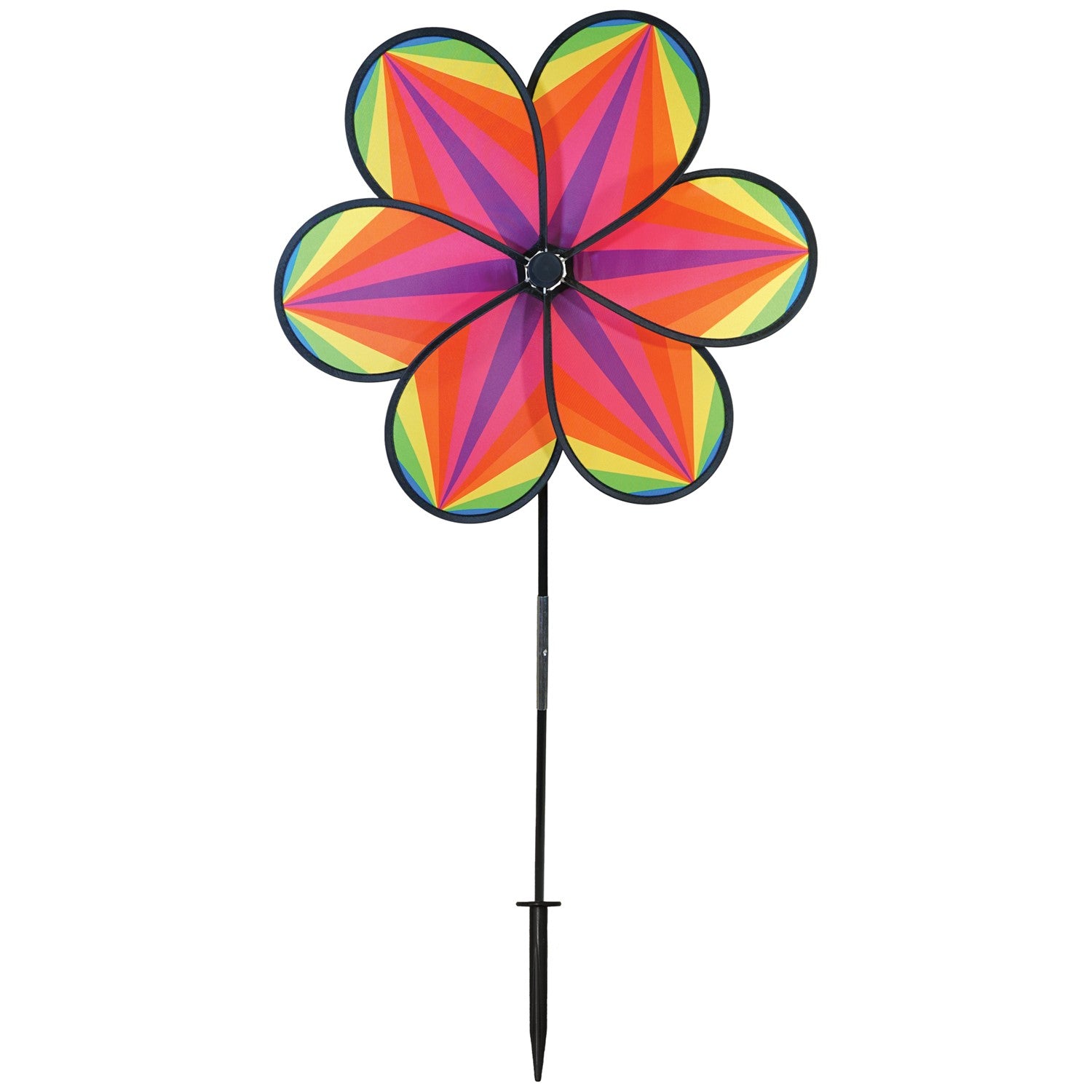 19-inch Rainbow Star Flower Spinner with colorful striped petals spinning in the breeze, displayed in a garden setting.