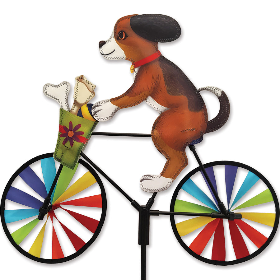 20 in. Bike Spinner - Puppy displayed outdoors, featuring colorful puppy designs that spin gracefully in the wind.