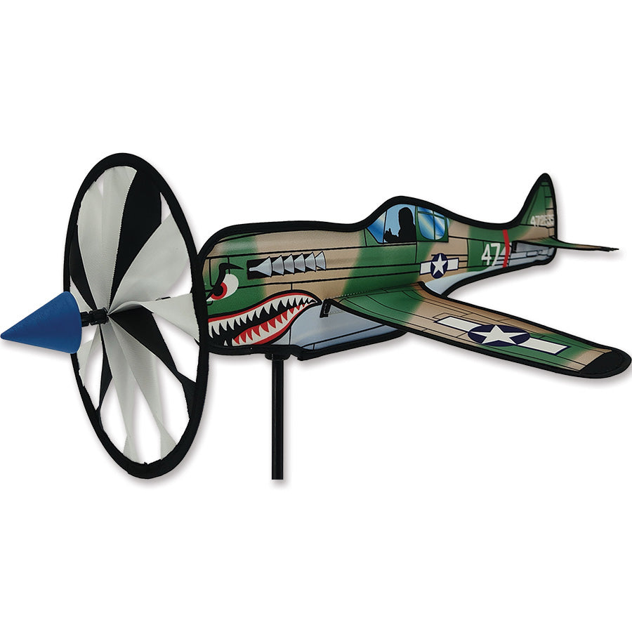 20 in. P-40 Warhawk spinner lawn ornament, showcasing vibrant colors and detailed design, positioned for spinning in a garden setting.