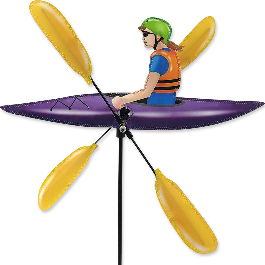 20 in. Lady Kayaker WhirliGig Spinner with vibrant colors and whimsical design, spinning elegantly on an oversized ground stake in a garden setting.