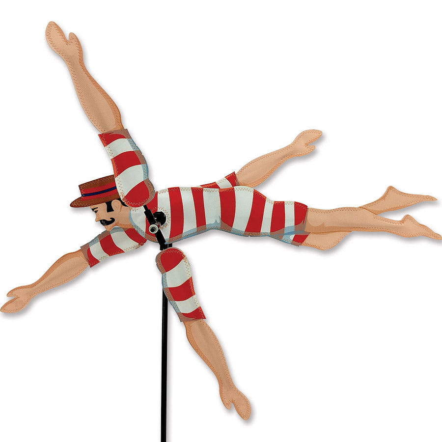 20 in. WhirliGig Spinner - Victorian Swimmer, showcasing colorful fabric wings spinning gracefully in a garden setting.