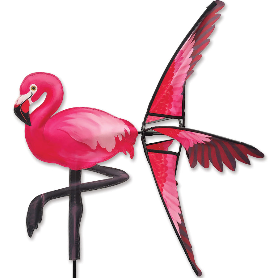 Colorful 21 in. Pink Flamingo Spinner dancing in the breeze, featuring bright pink hues and whimsical design for garden decor.