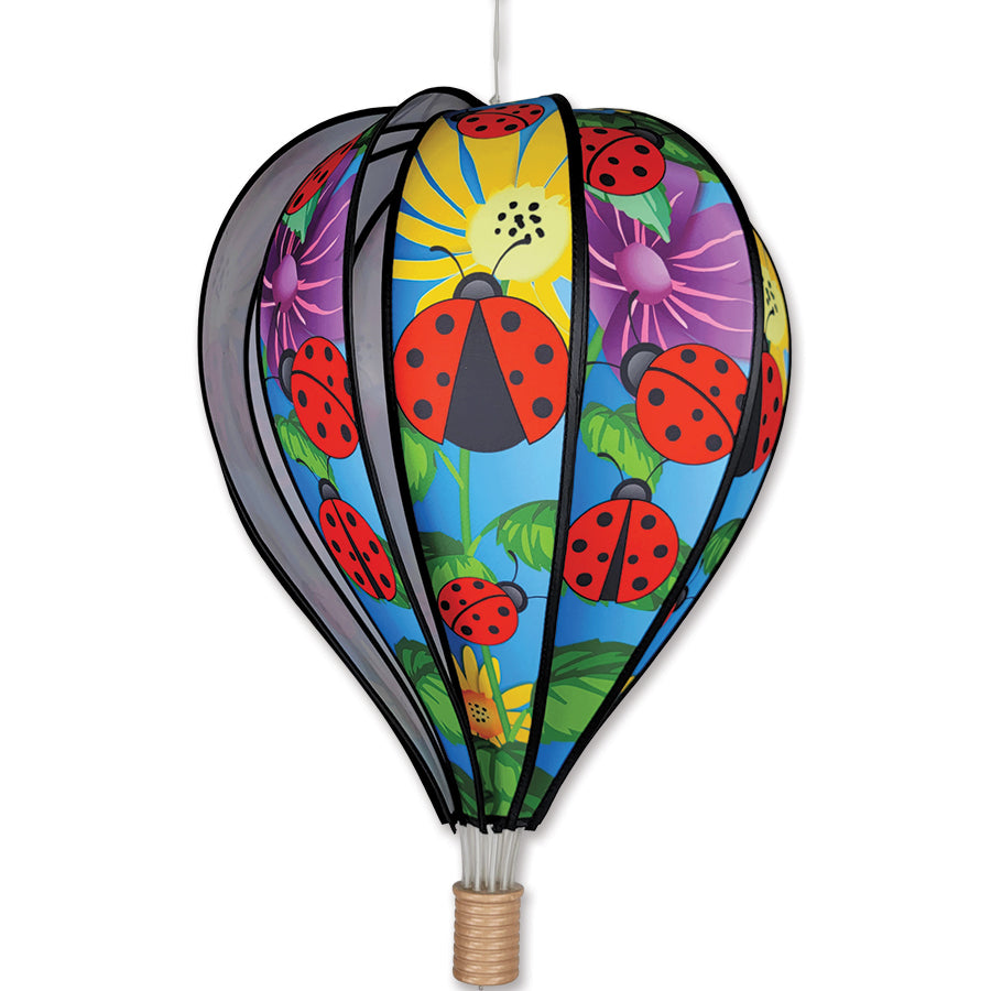 22 in. Hot Air Balloon - Ladybug garden decoration spinning in the breeze, showcasing vibrant ladybug design against the sky.
