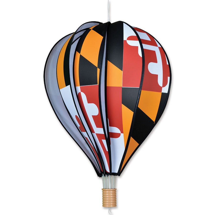 22 in. Hot Air Balloon - Maryland, a colorful spinning decoration, hangs outdoors against a clear sky, showcasing the Maryland flag design.