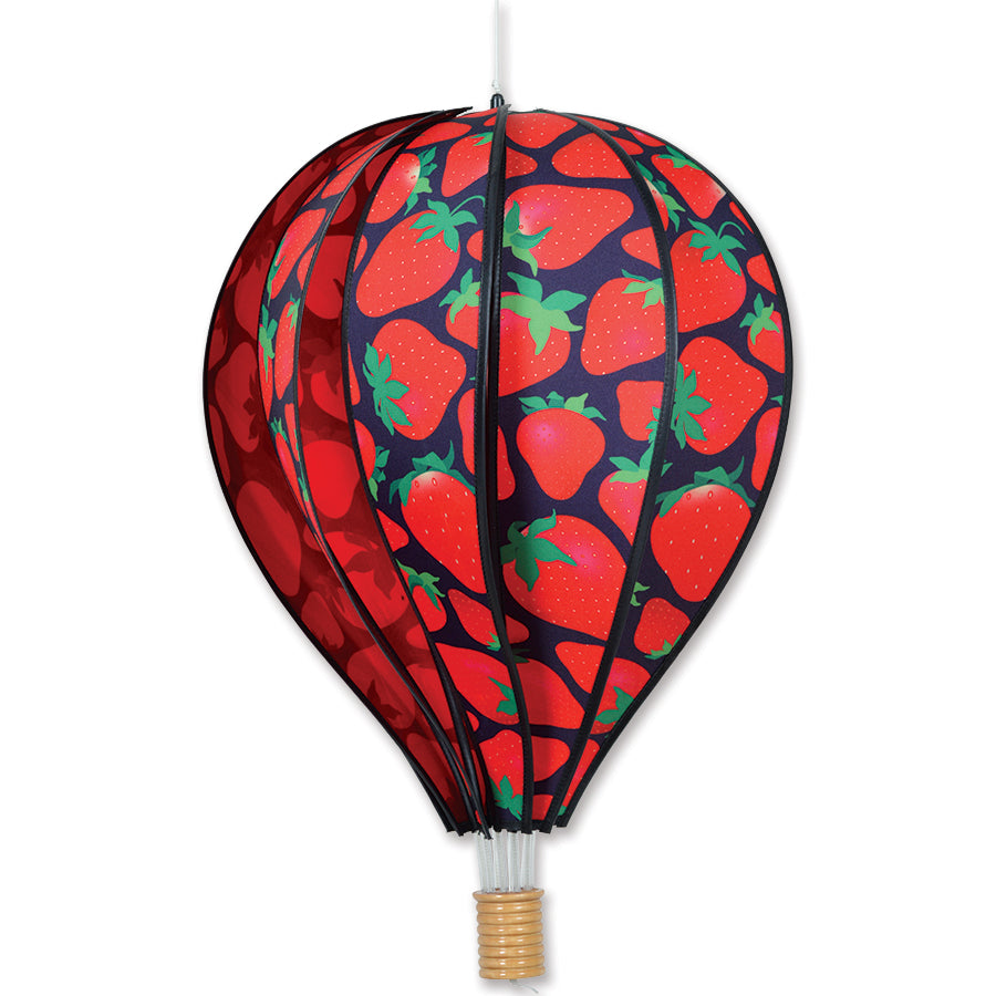 22 in. Hot Air Balloon decoration featuring vibrant strawberries, spinning gently in a garden setting, adding charm to outdoor spaces.