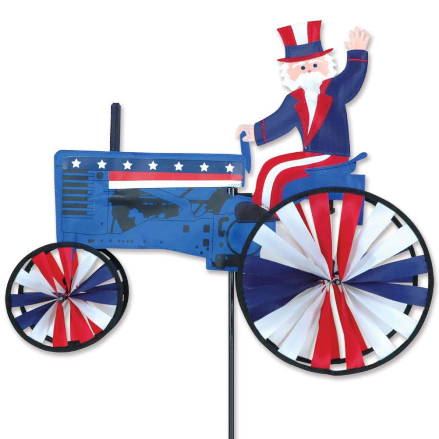 22-inch Uncle Sam on a Tractor Spinner featuring a colorful design of Uncle Sam on a tractor, spinning playfully in a garden setting.