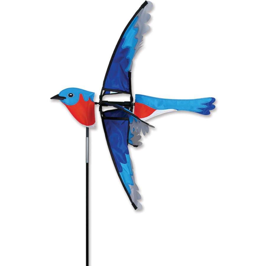 23 in. Bluebird Spinner featuring colorful bluebird motifs spinning in the wind in a lush garden setting.