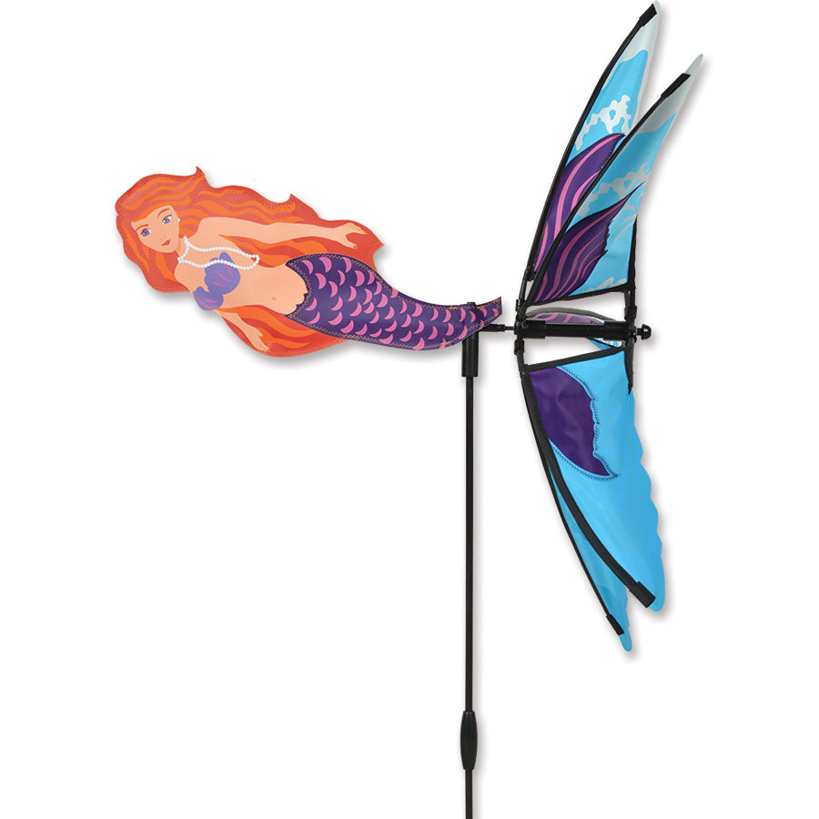 24 in. Mermaid Spinner featuring a colorful mermaid design, spinning gracefully in a garden, capturing sunlight with vibrant colors.