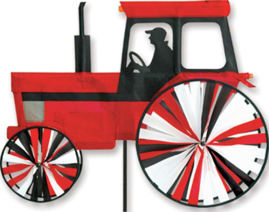 Vibrant red 24 in. Modern Tractor Spinner displayed in a garden, showing a detailed tractor design that spins delicately in the wind.