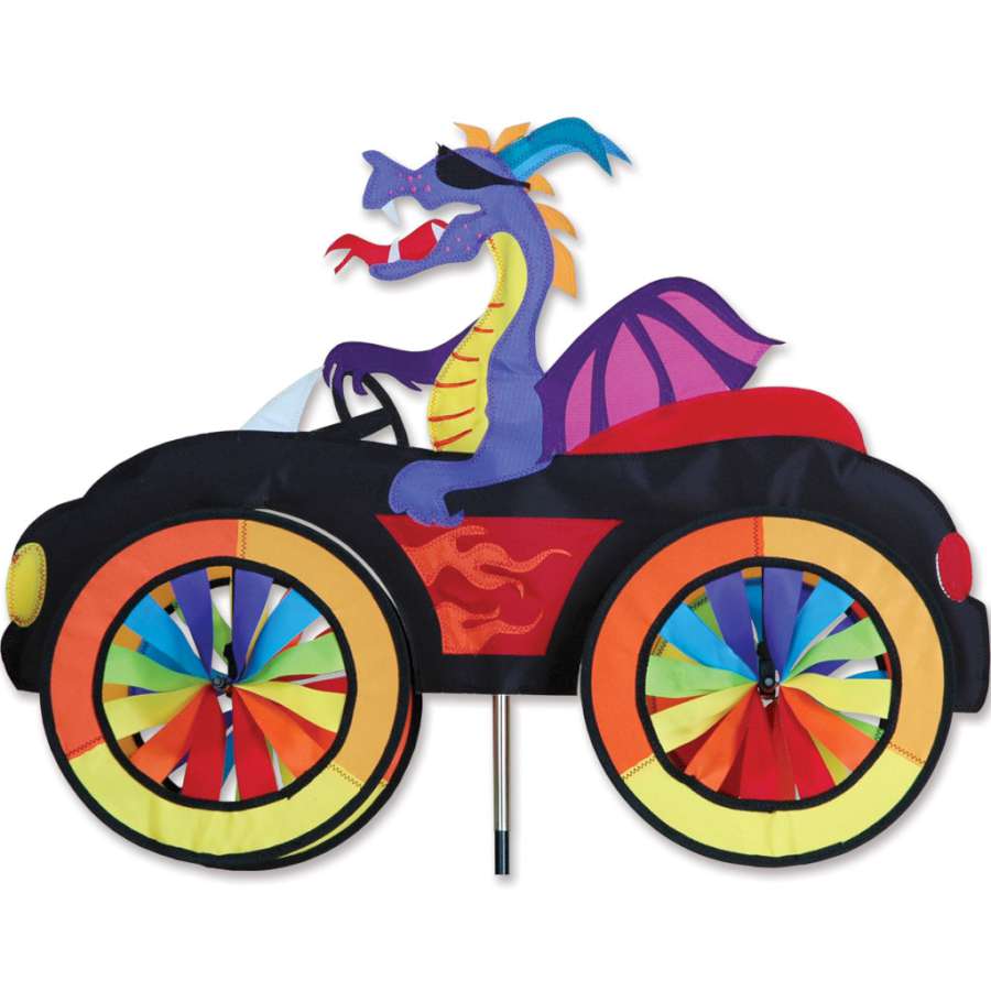 25 in. Car Spinner - Dragon featuring a vibrant dragon design and colorful panel-rimmed wheels, spinning in a garden setting under sunny skies.