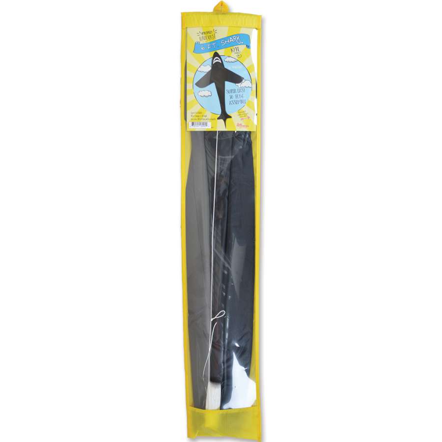 25 in. Shark Diamond Kite featuring a vibrant shark design, showing its durable construction while flying in a clear blue sky.