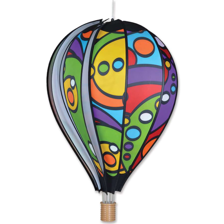 26 in. Hot Air Balloon - Rainbow Orbit with colorful spinning design hanging outdoors in a vibrant garden setting.