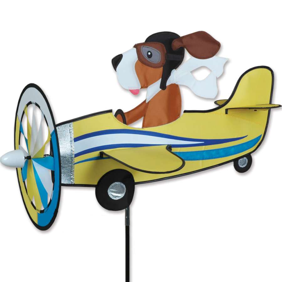 27 in. Pilot Pal Spinner with colorful aviator design spinning in a garden under sunlight, displaying playful movement.