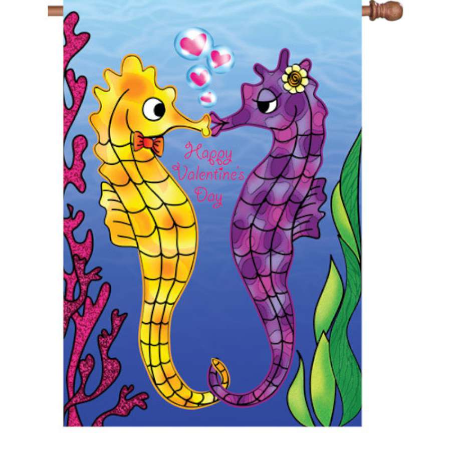 28 in. Be My Valentine flag featuring colorful hearts and romantic designs displayed on a house flag stand in a garden setting.