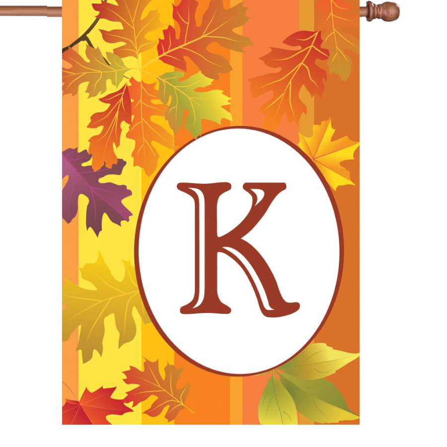 28 in. Fall Monogram Flag - K with intricate designs and autumn colors displayed proudly outdoors, enhancing seasonal decor for the home.