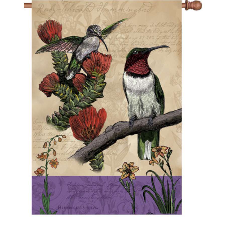 28 in. All Hummingbirds flag displayed on a garden flagpole, featuring vibrant hummingbird designs that bring color and charm to the yard.