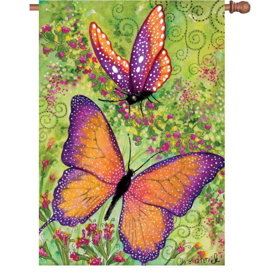 28 in. illuminated garden flag with a vibrant butterfly design, showing colorful accents in a garden setting, perfect for outdoor decoration.