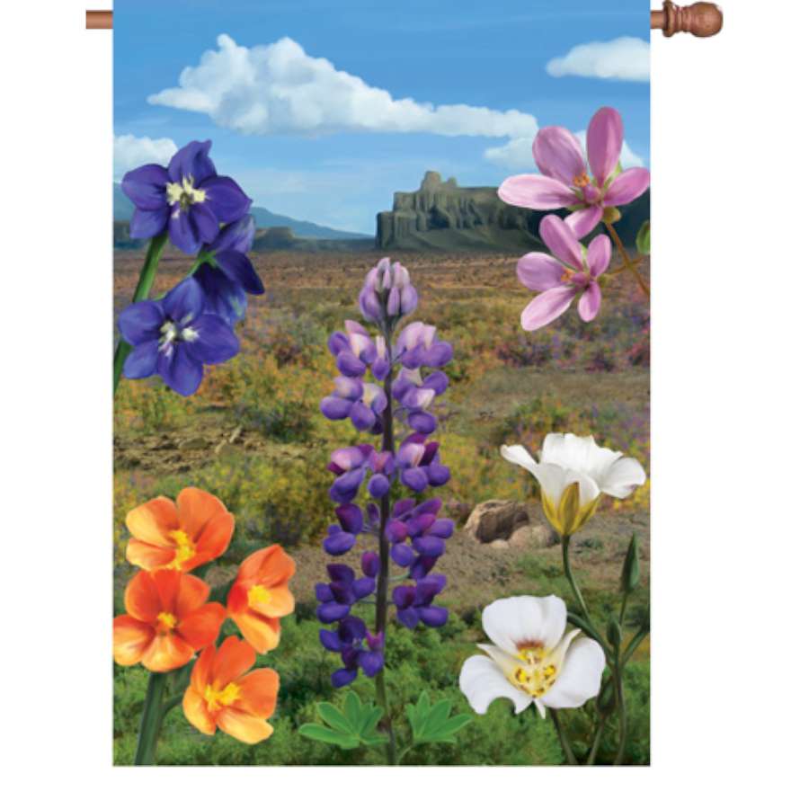 28 in. Flag - Desert In Bloom featuring colorful flowers against a desert backdrop displayed on a garden pole in an outdoor setting.