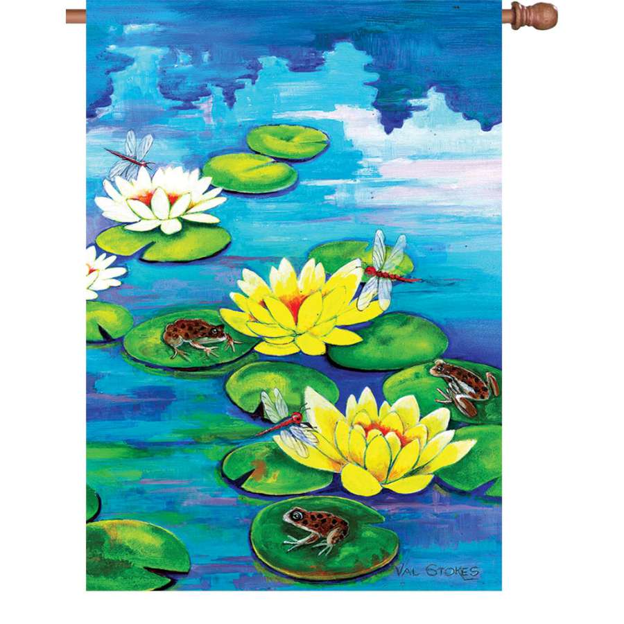 28 in. Frisky Frogs illuminated garden flag featuring vivid frog designs displayed outdoors in a garden setting.