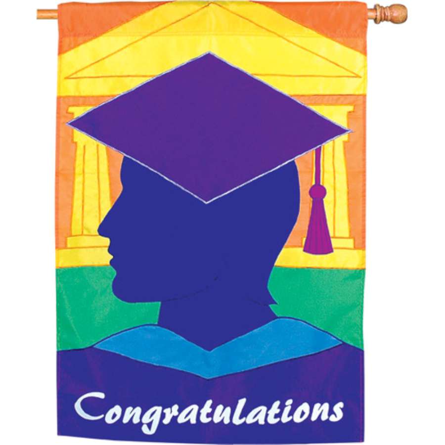 28 in. Flag - The Graduate displaying the word 'Congratulations' in bold colors, designed for outdoor use in a garden setting.