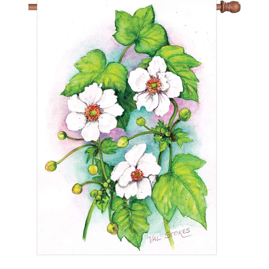 28 in. Floral Impressions illuminated house flag featuring vibrant flowers displayed on a flagpole in a sunny garden setting.