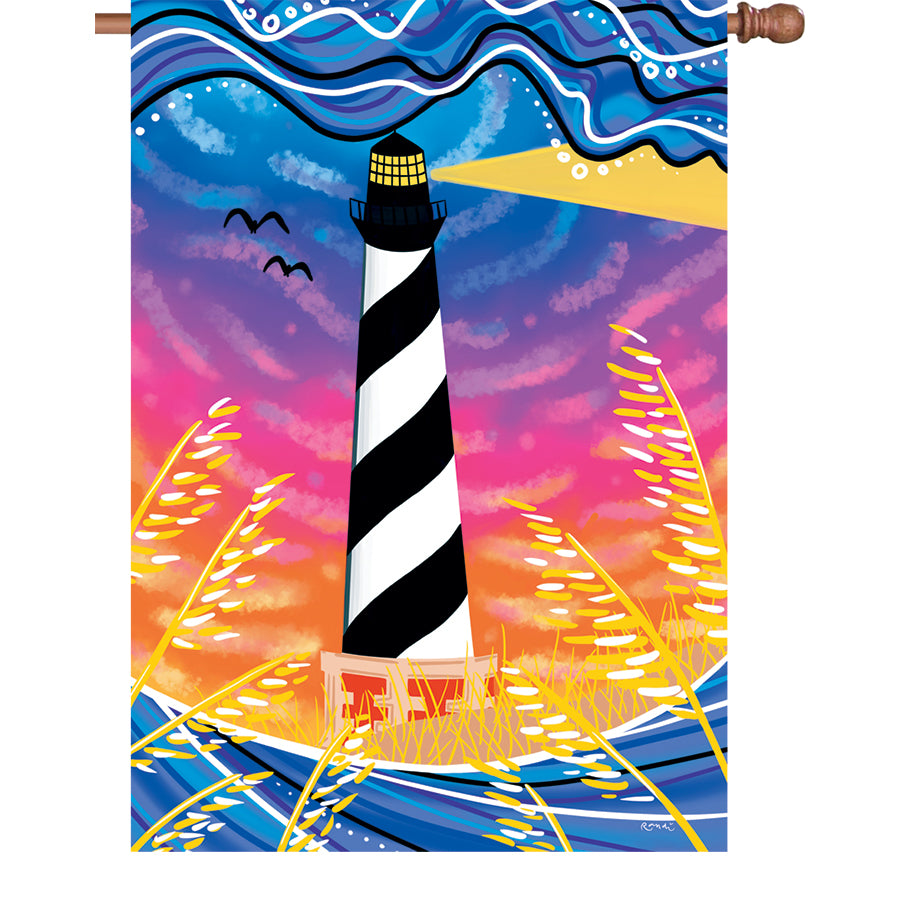 28 in. illuminated garden flag featuring the Hatteras Sunset design, showcasing vibrant colors and a beautiful sunset in a garden display.